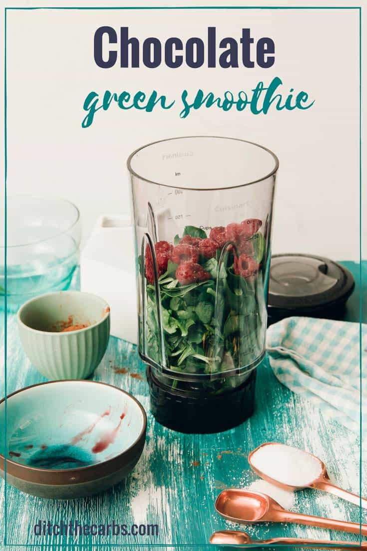 ingredeints for a chocolate green smoothie sitting in a blender