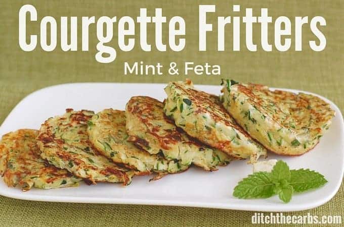 Super easy recipe for courgette mint feta fritters. These tick so many boxes - wheat free, low carb, and packed with greens. | ditchthecarbs.com