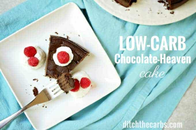 low-carb chocolate-heaven cake served with whipped cream and berries