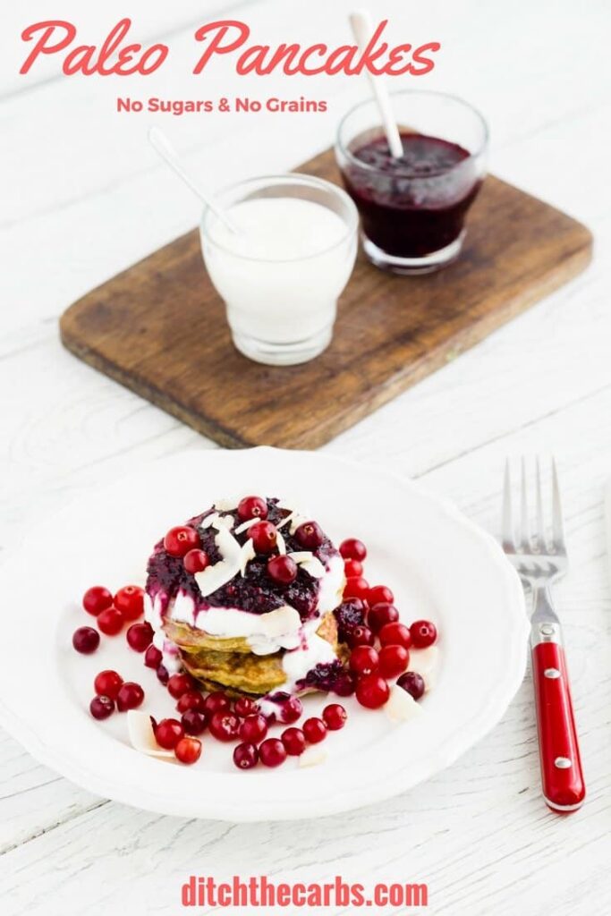 A stack of Palio pancakes served with coconut cream and fresh berries