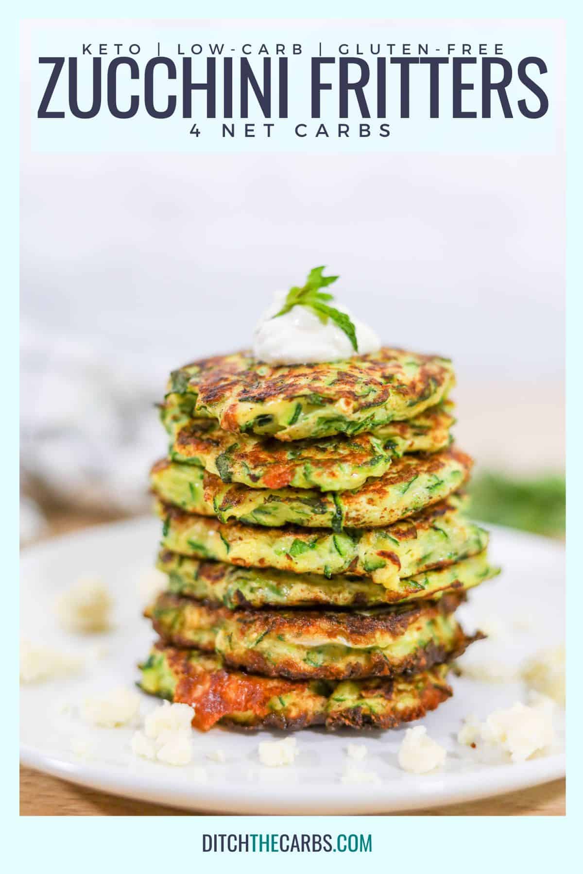 keto zucchini fritters stacked on a white plate