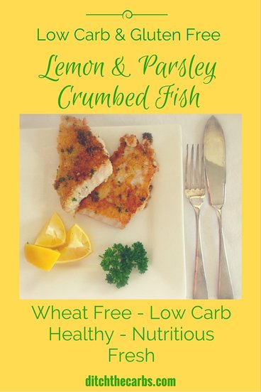 Gluten-free lemon and parsley crumbed fish served with slices of lemon and parsley