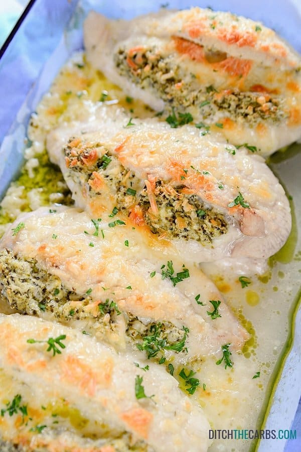 Freshly baked two-cheese chicken with pesto.