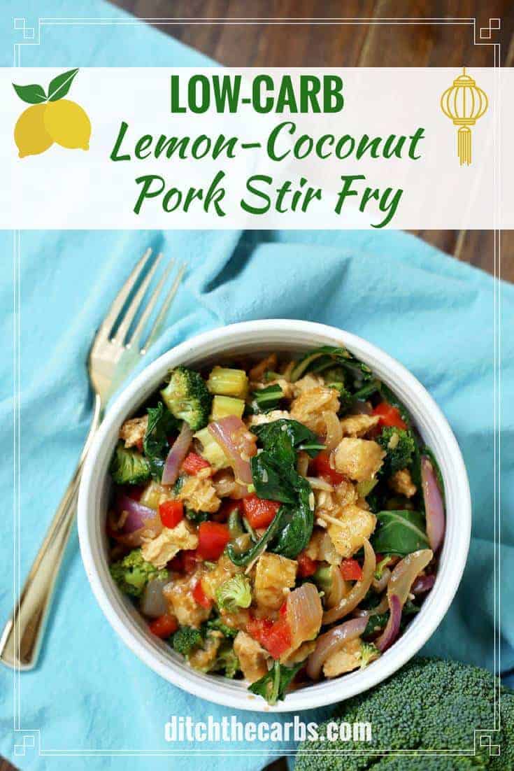 low-carb lemon and coconut pork stir fry served in a white dish on a blue cloth
