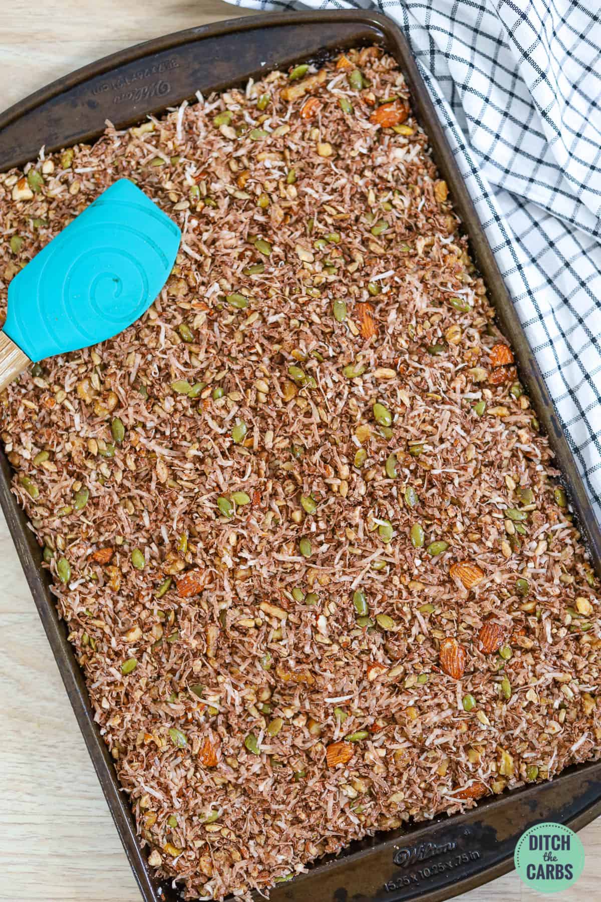 keto chocolate granola in a sheet pan