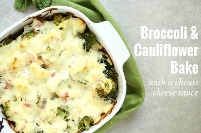 A serving dish with cheesy baked broccoli and cauliflower