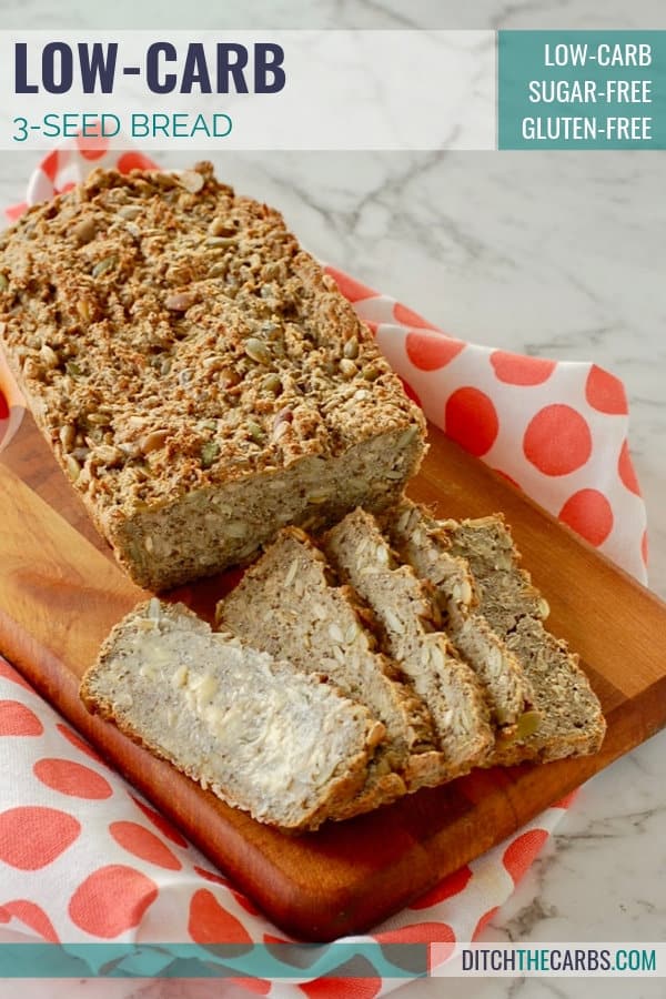 low carb 3 seed bread sliced and served with melting butter