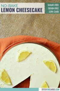 Lemon cheesecake sliced and garnished with lemons