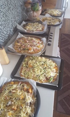 a display of Fat Head pizzas made by readers