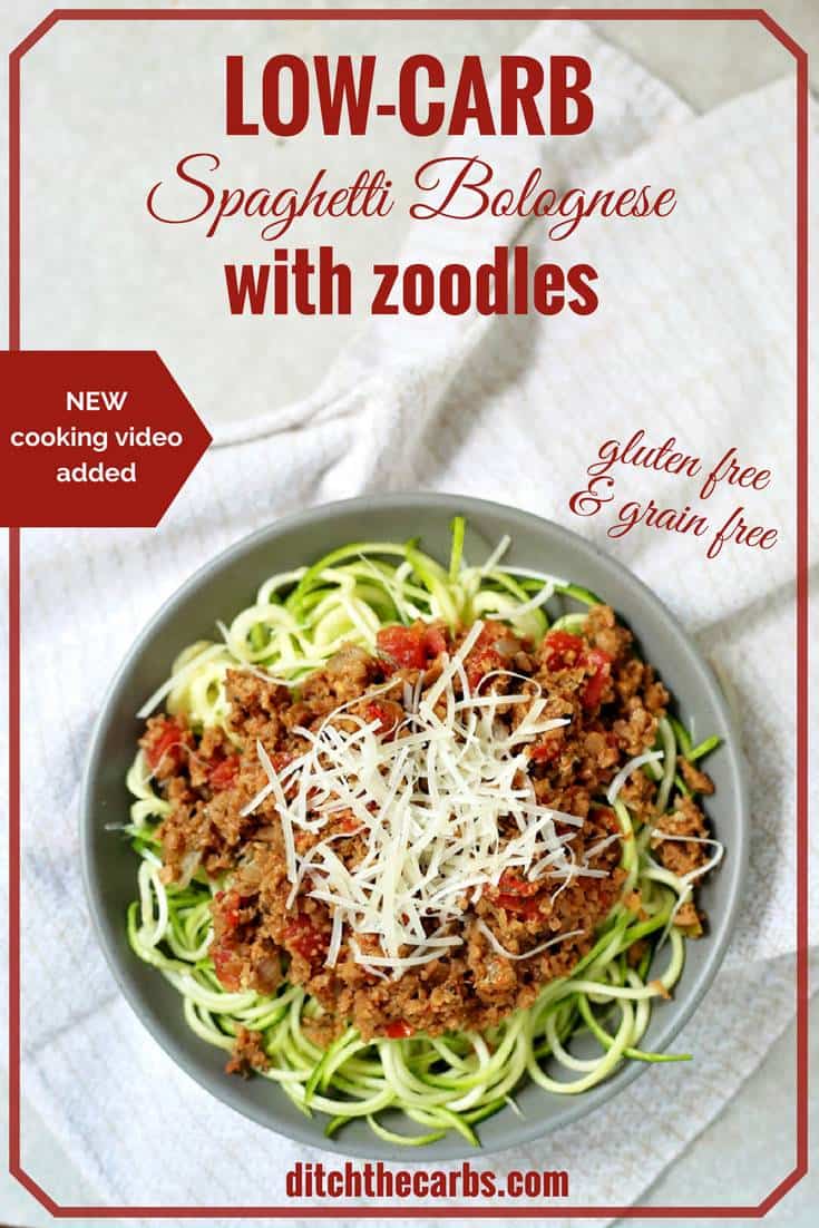 Spaghetti Bolognese with zoodles served with shredded cheese