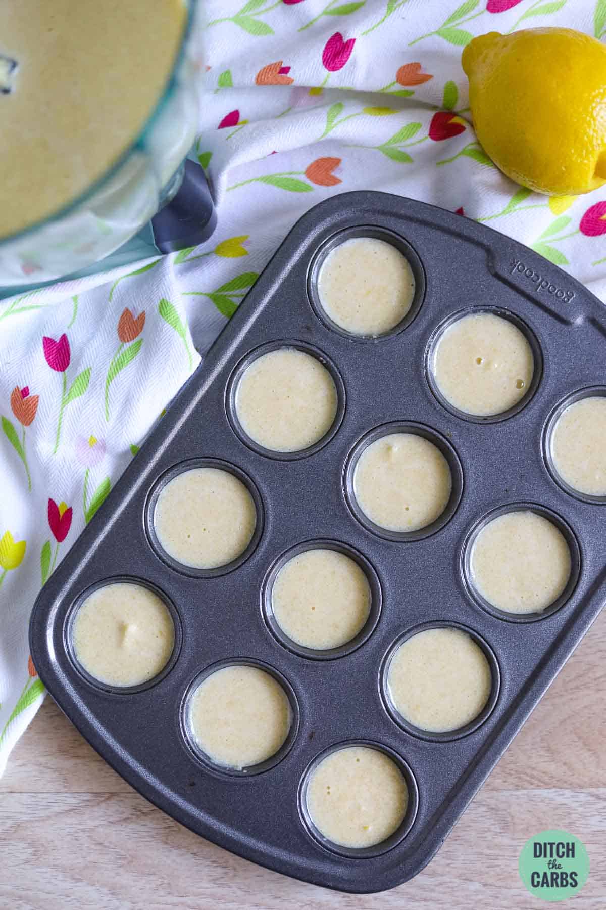cupcake batter for keto lemon cupcakes in a small mini cupcake tray
