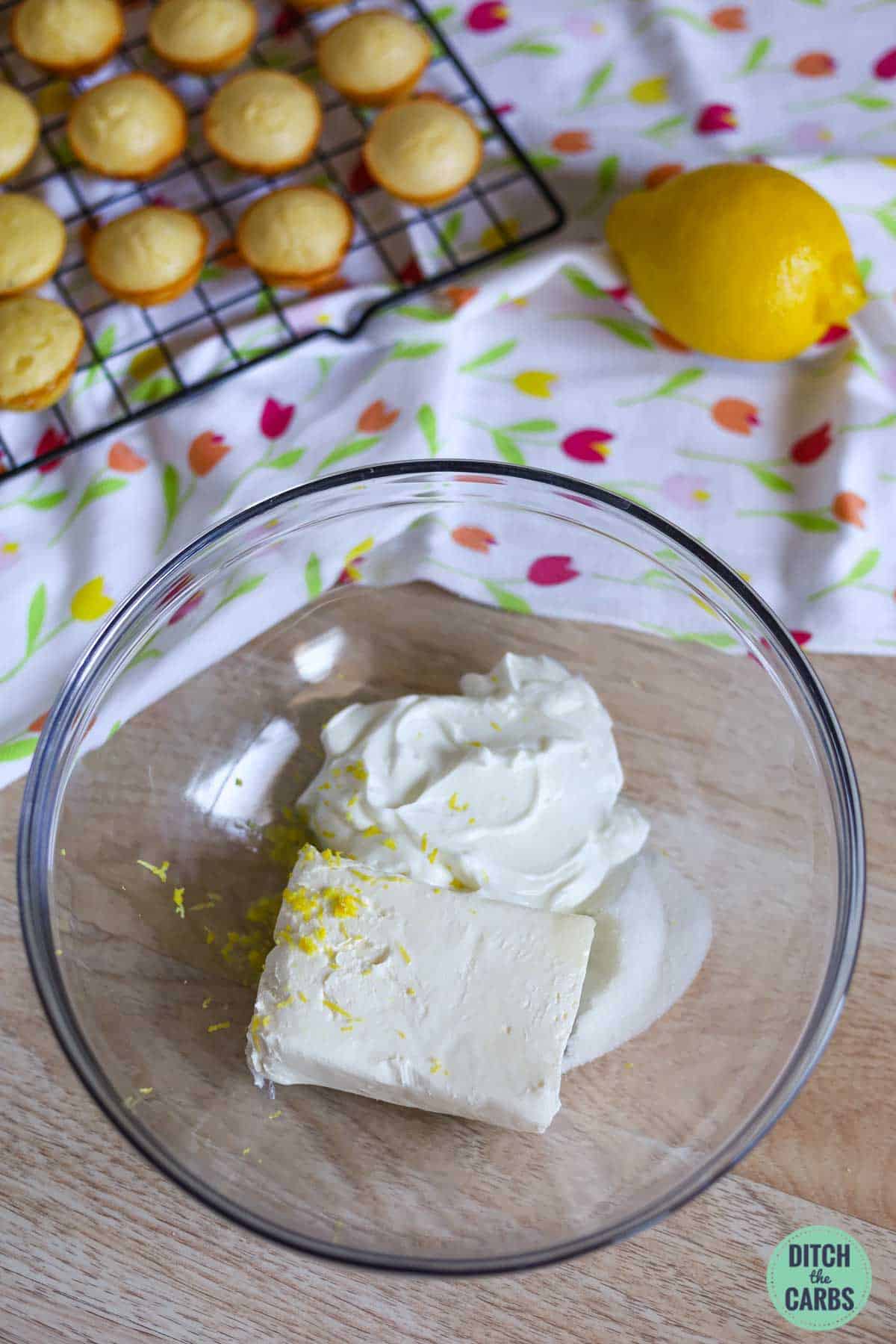 cream cheese and lemon in a large mixing bowl