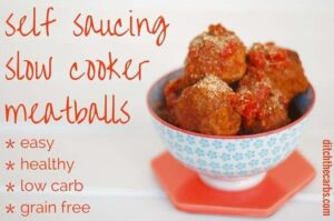 A close up of cooked meatballs from the slow cooker, served in a blue and white ceramic dish
