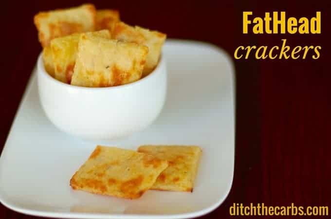 Fat head cheese crackers in a white bowl on a dark table