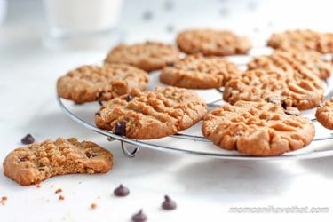Peanut butter cookies on a plate and wire rack