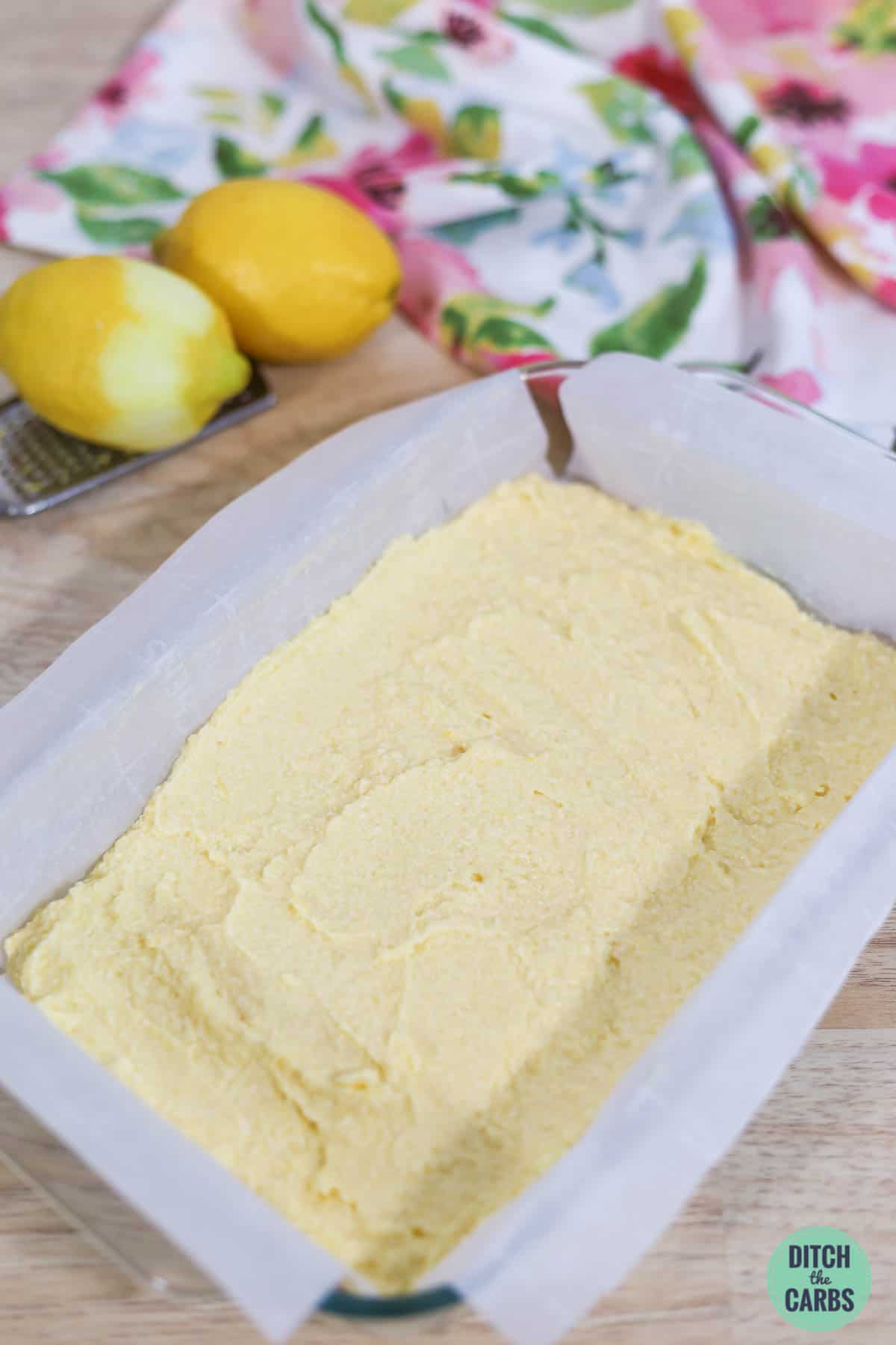keto lemon cake batter in a rectangle baking dish