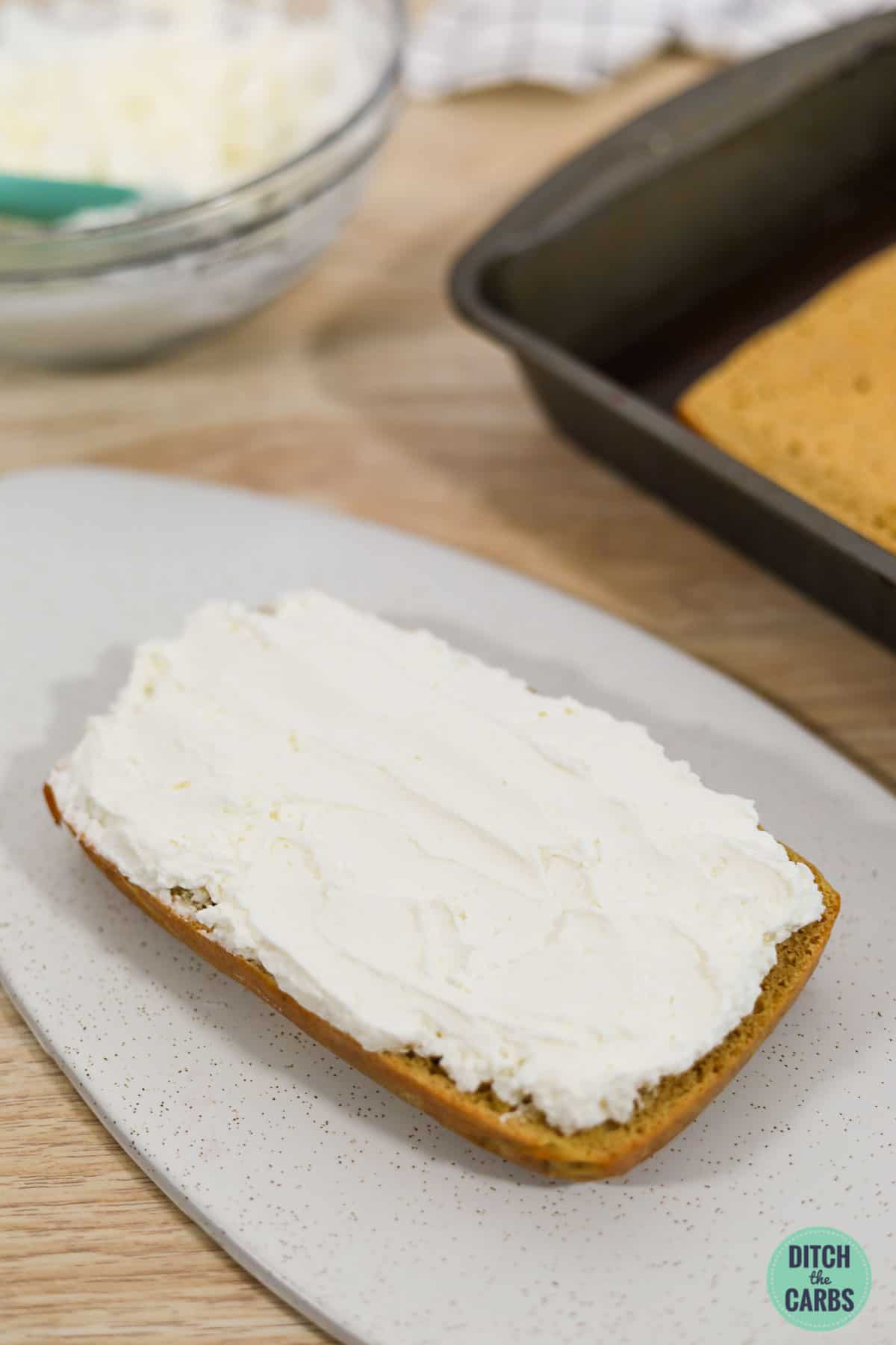 coconut flour cake covered with whipped cream