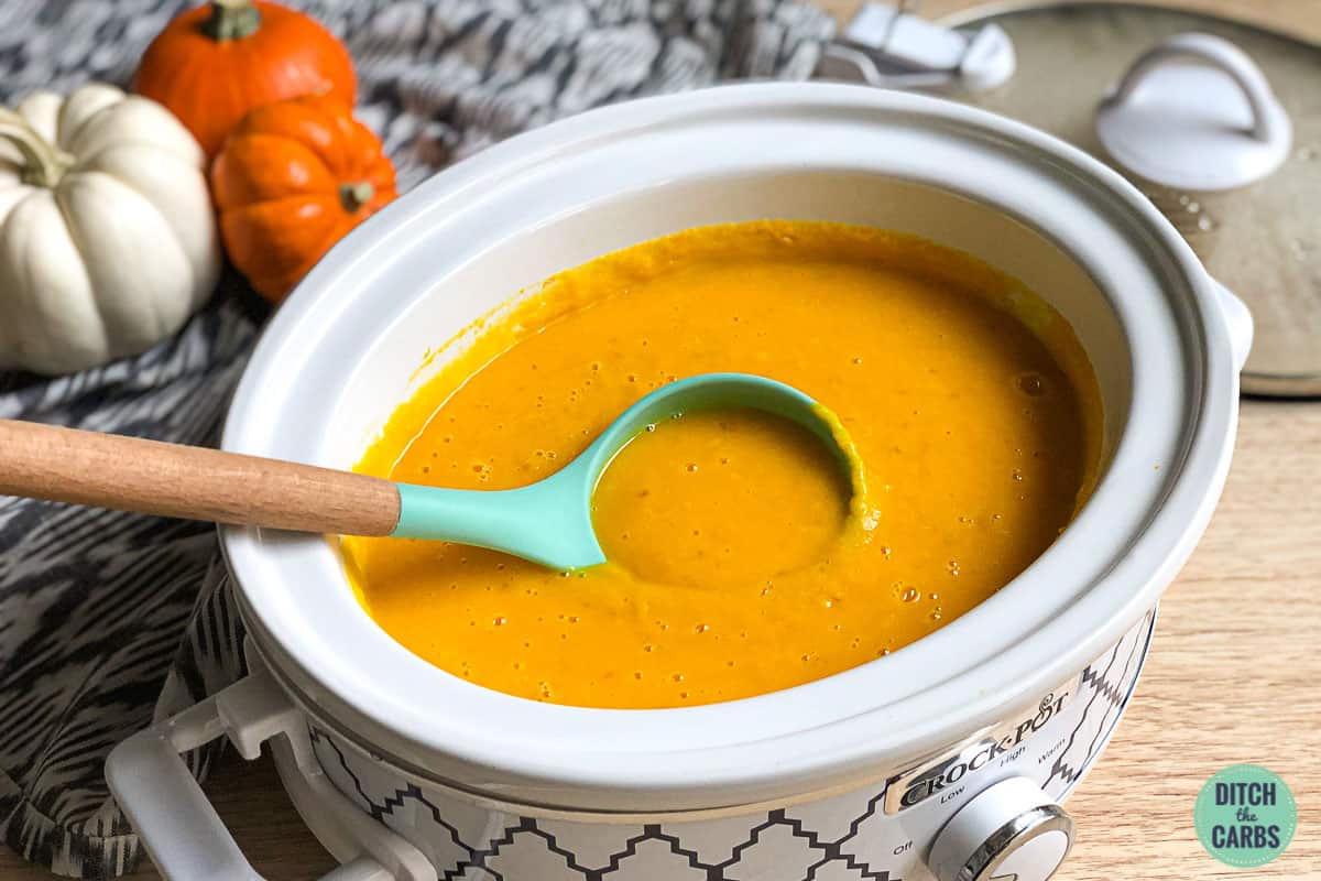pureed smooth keto pumpkin soup in the slow-cooker