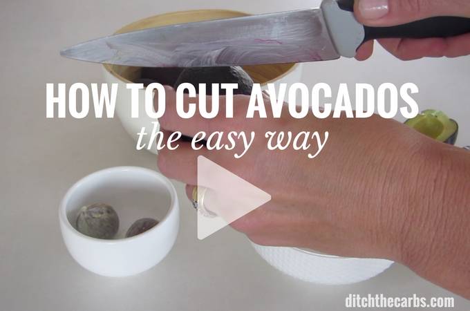 How to cut avocados showing hands and an avocado being cut widthwise
