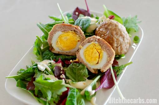 Scotch eggs served on salad with mayonnaise