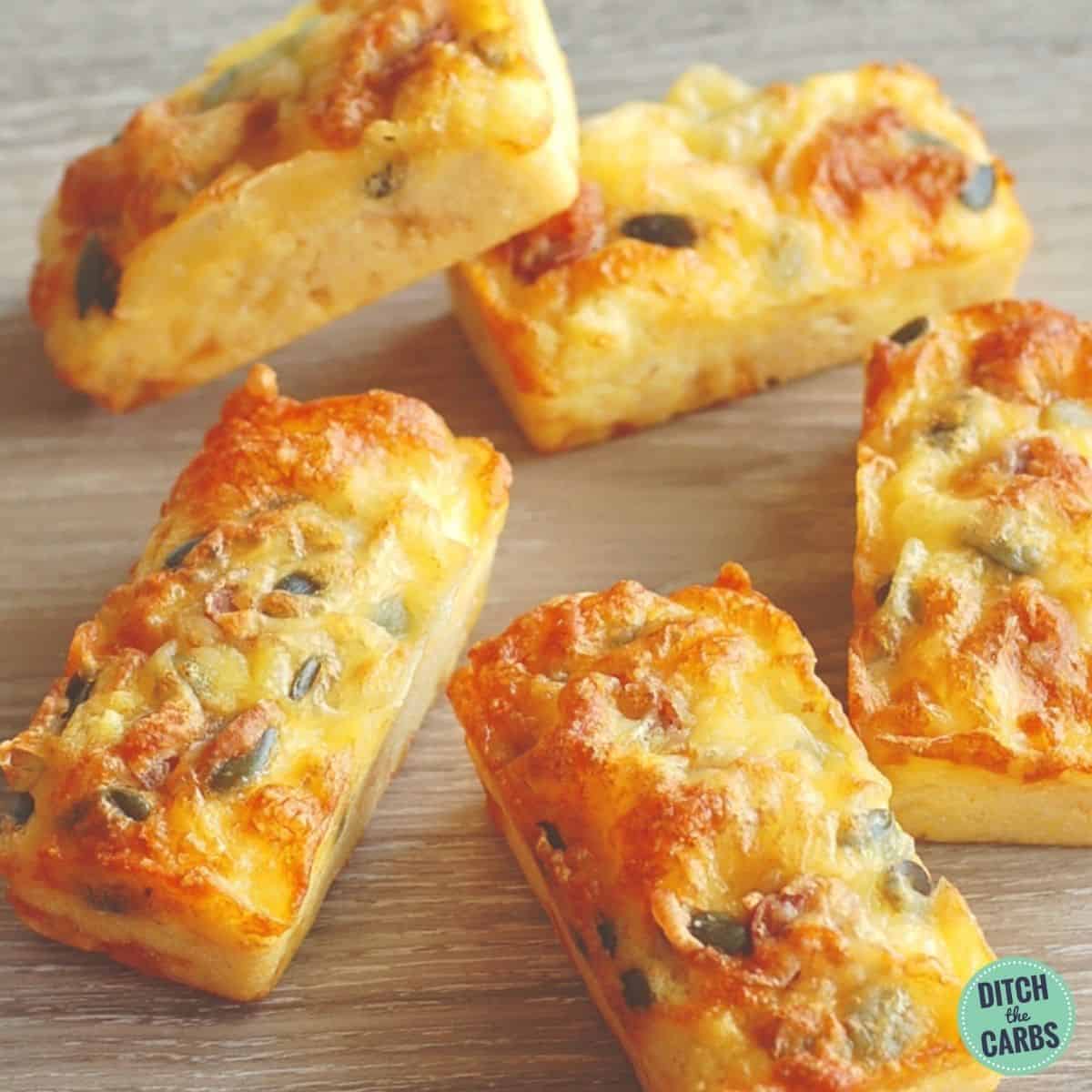 cheese loaves on a wooden chopping board