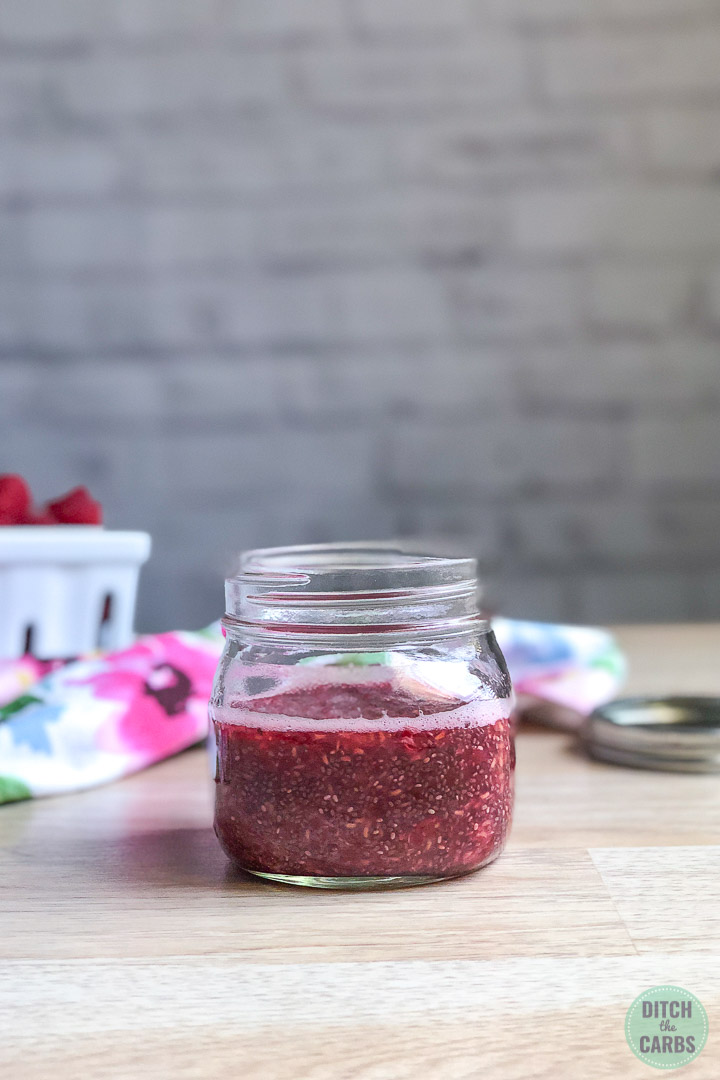 Jar filled with raspberry chia seed jam