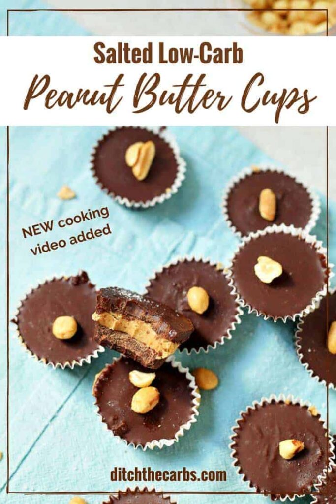 Peanut butter chocolate cups on a blue board sprinkled with peanuts
