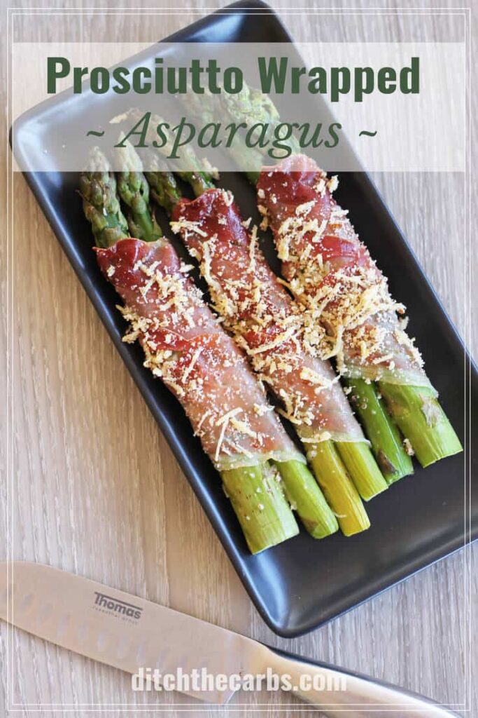 A close up of low-carb prosciutto wrapped asparagus