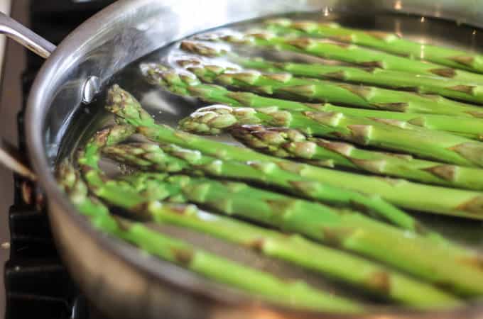 A pan filled with asparagus
