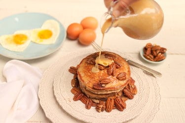 Pancakes stacked and poured with sugar-free maple syrup
