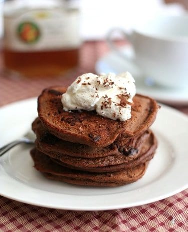 Chocolate pancakes with cream