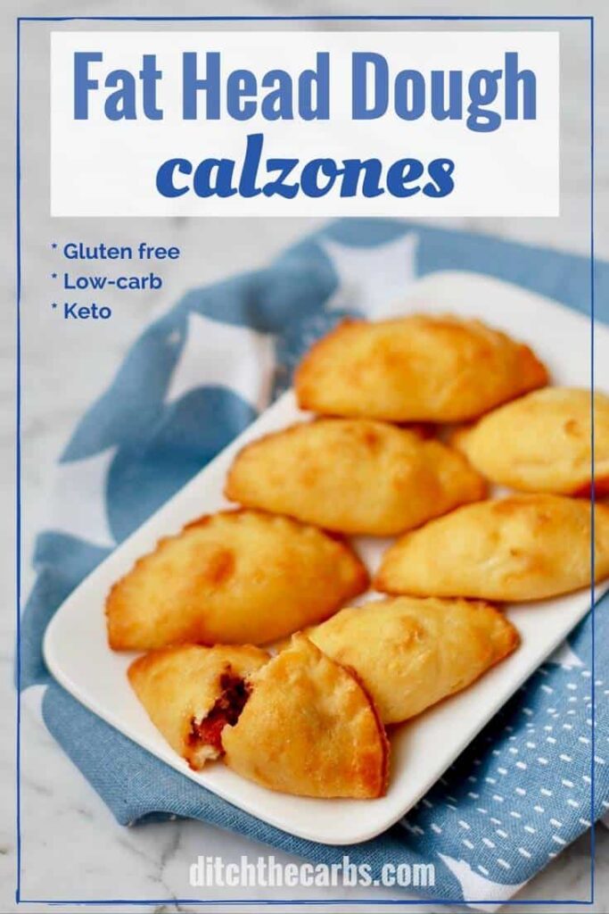 A close up of calzones on a white plate