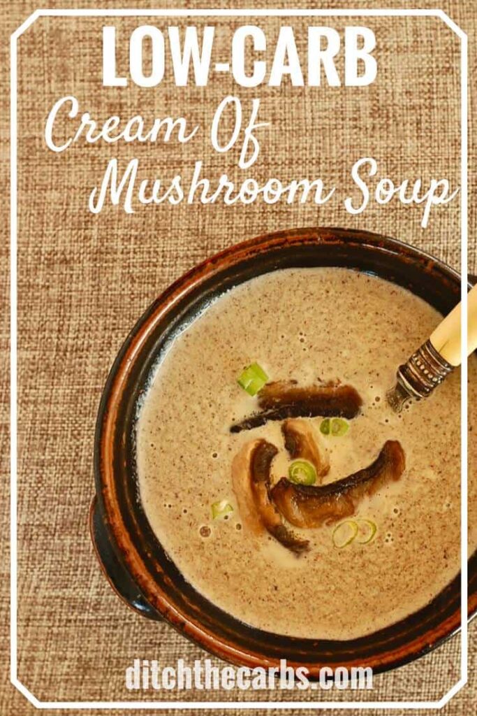 Mushroom soup served in a brown pottery bowl