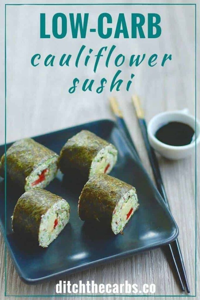 Low-carb cauliflower sushi with chopsticks and soy sauce