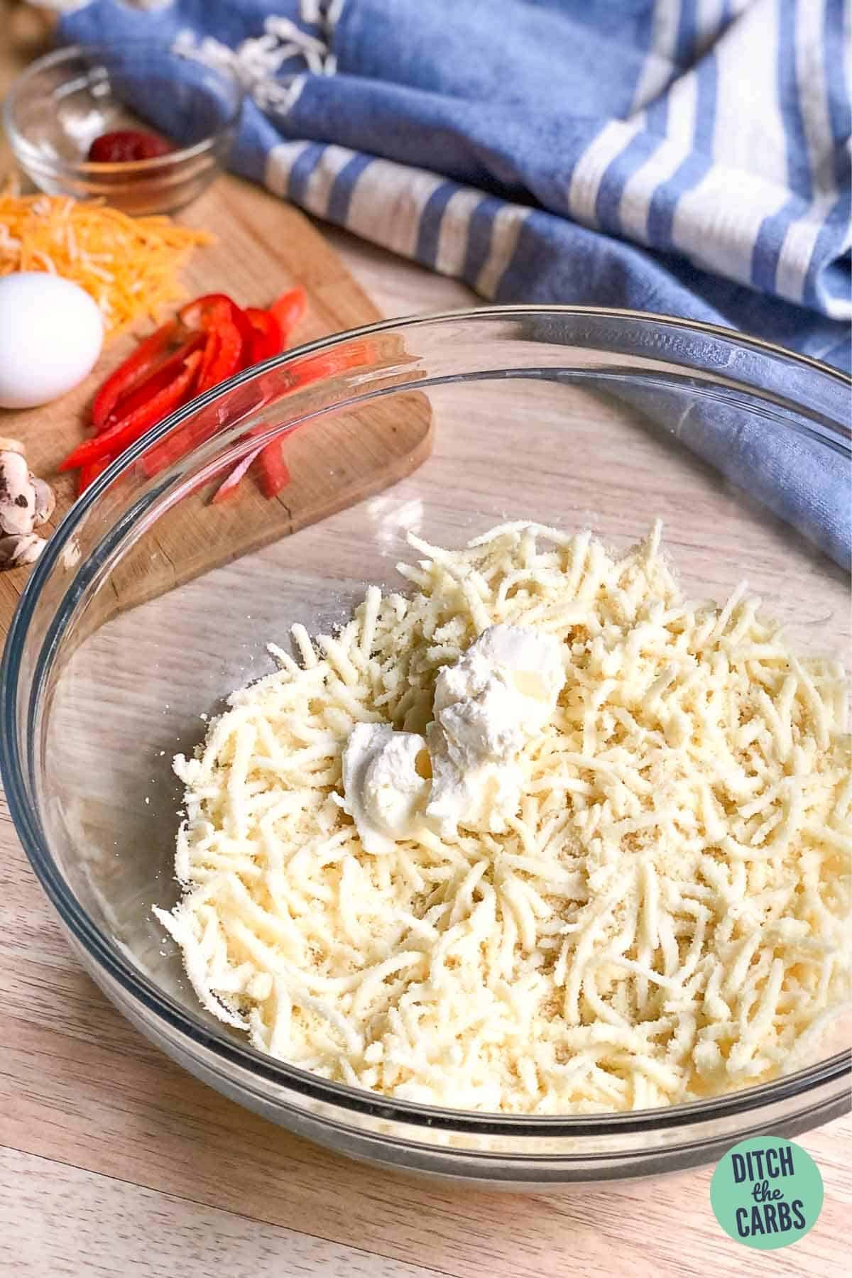 ingredients to make mozzarella dough in a glass bowl