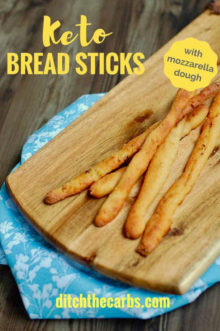 keto breadsticks sitting on top of a wooden table