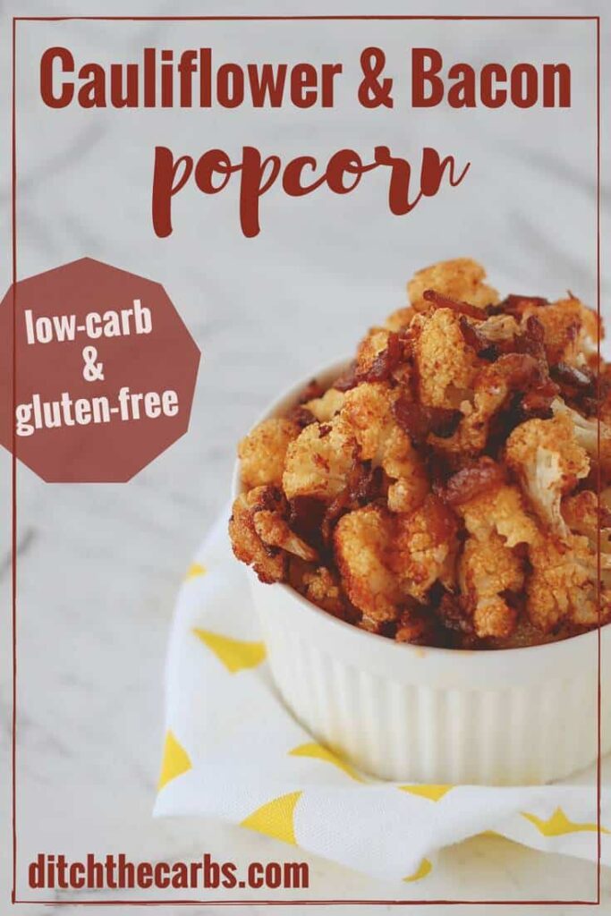 Crispy cauliflower bacon popcorn served in a white dish on a marble benchtop