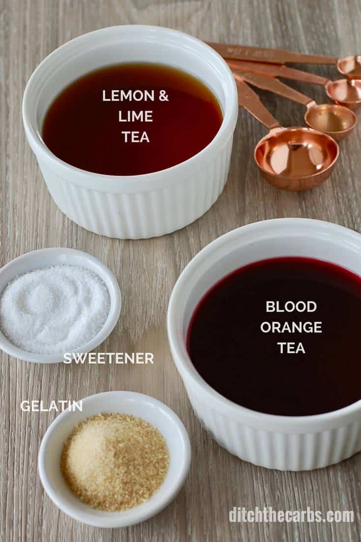 Flavoured tea in white dishes with sweetener, gelatin and measuring spoons 