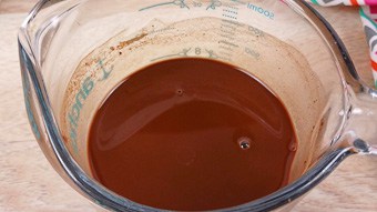 Chocolate sauce in a glass pouring jug
