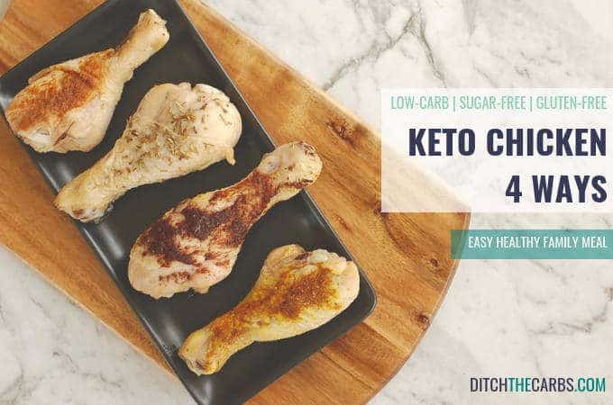 Cooked chicken drumsticks on a wooden cutting board 