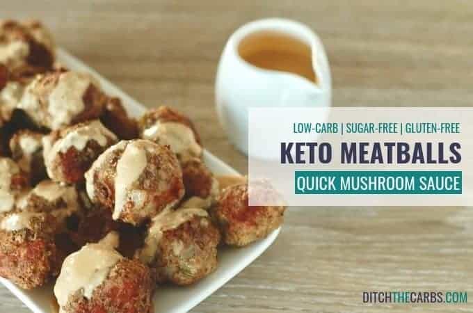 Ground beef meatballs drizzled with low-carb mushroom sauce sitting on a wooden table with a saurce jug