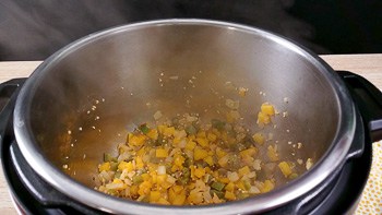Vegetables being sauteed in the Instant Pot 