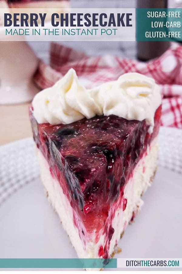 berry cheesecake served on a white plate with a read and white check cloth