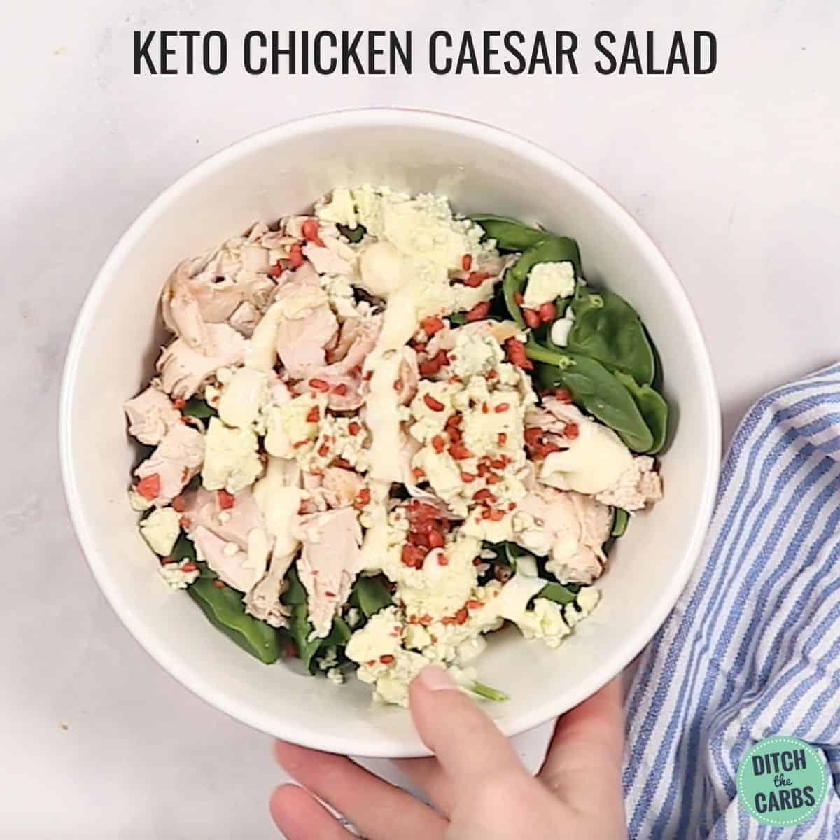 lazy keto chicken salad in a bowl with blue cloth