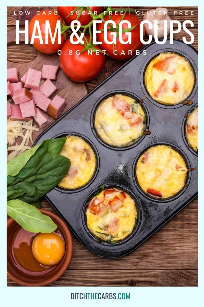 baked ham and egg cups in a muffin tray with diced ham and tomatoes on a chopping baord