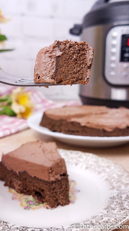 low-carb Instant Pot chocolate cake being lifted with a fork