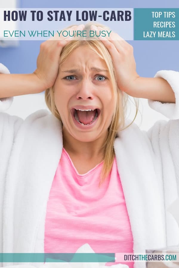 Woman screaming with her head in her hands