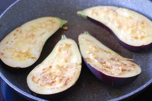 For eggplant halves cooking in the frying pan