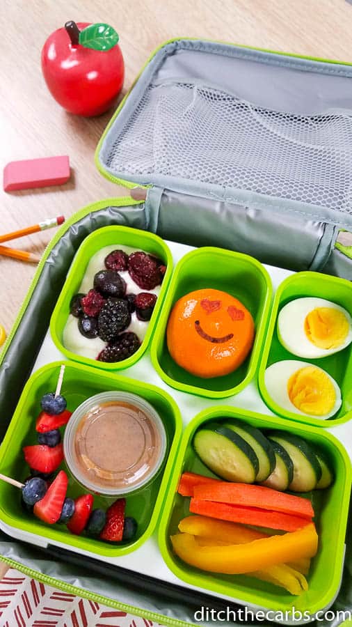 A plastic container filled with different types of healthy lunchbox ideas for children