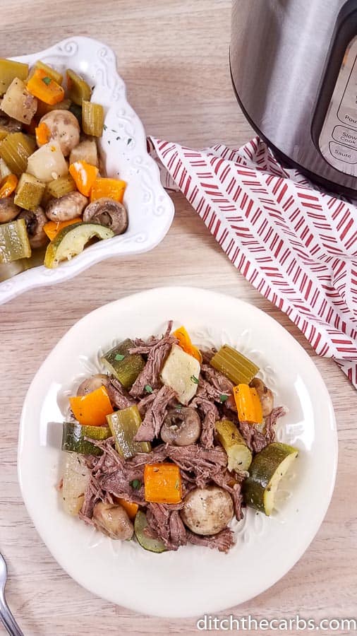 Instant pot roast beef with vegetables served